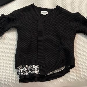 Black sweater. One cold shoulder. Worn a few times